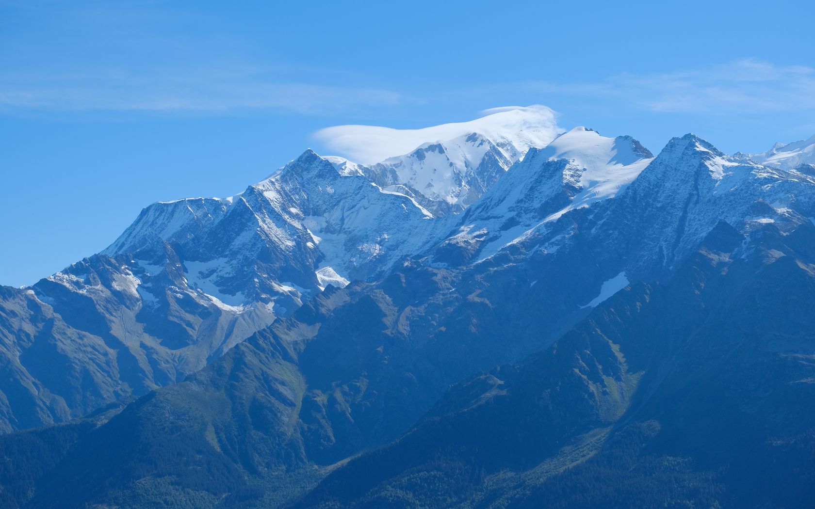 mountains_snow_clouds_213082_1680x1050.jpg