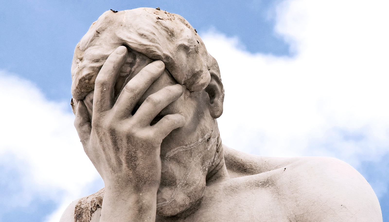 regret-statue-outside-louvre2_1600.jpg